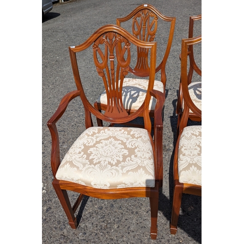 330 - 8x Shield back chairs with wheat motif including 2 carvers