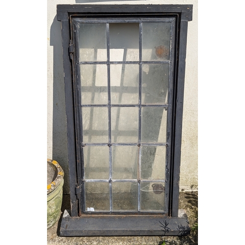 988 - Leaded light opening window frame - one pane cracked, one pane missing - 116 x 58 x 7cm