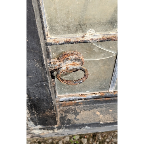 988 - Leaded light opening window frame - one pane cracked, one pane missing - 116 x 58 x 7cm