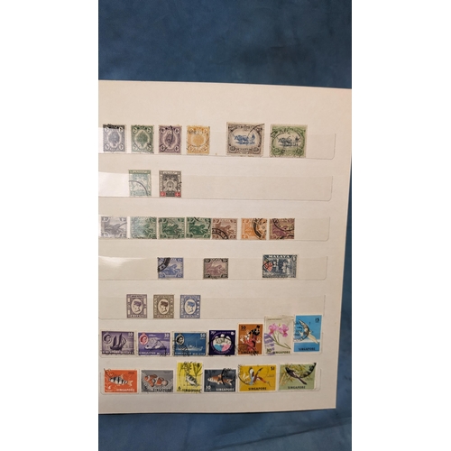 466 - British Empire & Commonwealth collection of stamps in album including: Hong Kong; Gibraltar; Falklan... 