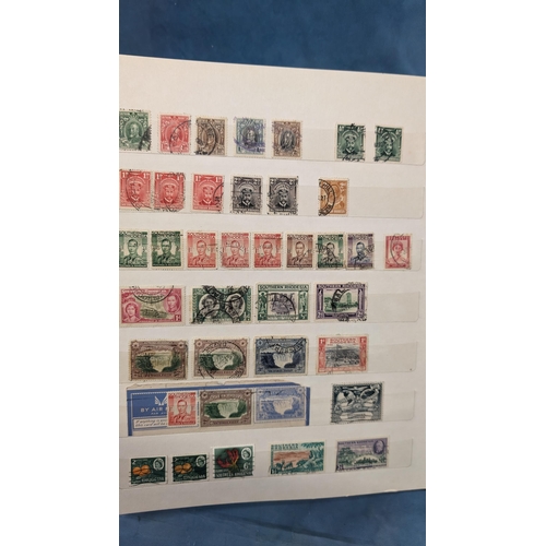 466 - British Empire & Commonwealth collection of stamps in album including: Hong Kong; Gibraltar; Falklan... 