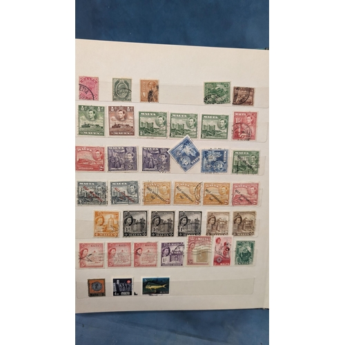 466 - British Empire & Commonwealth collection of stamps in album including: Hong Kong; Gibraltar; Falklan... 