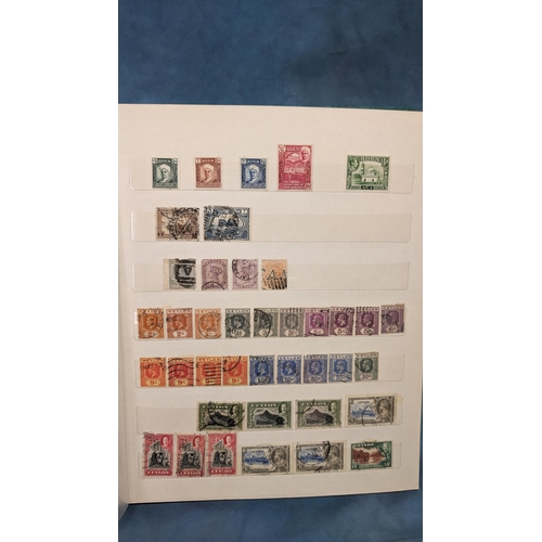 466 - British Empire & Commonwealth collection of stamps in album including: Hong Kong; Gibraltar; Falklan... 