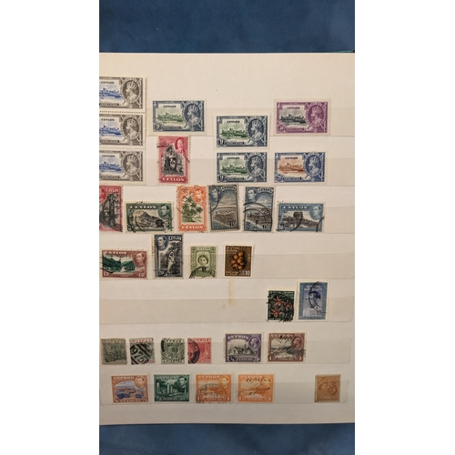 466 - British Empire & Commonwealth collection of stamps in album including: Hong Kong; Gibraltar; Falklan... 