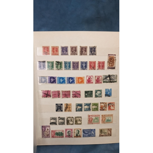 466 - British Empire & Commonwealth collection of stamps in album including: Hong Kong; Gibraltar; Falklan... 