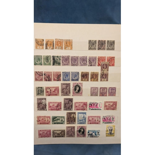 466 - British Empire & Commonwealth collection of stamps in album including: Hong Kong; Gibraltar; Falklan... 