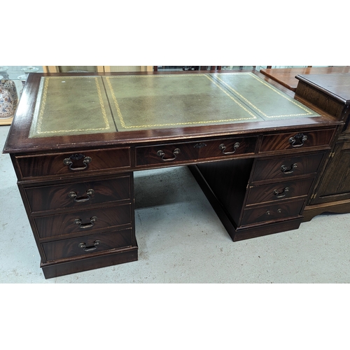 11 - A leather topped twin pedestal writing desk - 150 x 90 x 76cm