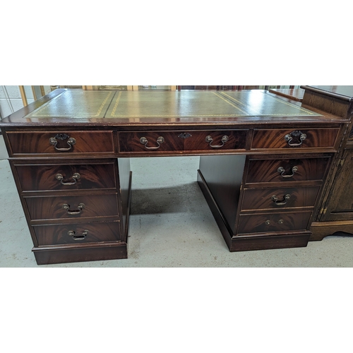 11 - A leather topped twin pedestal writing desk - 150 x 90 x 76cm