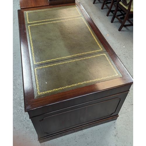 11 - A leather topped twin pedestal writing desk - 150 x 90 x 76cm