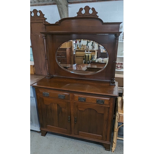 24 - An Edwardian mirror backed sideboard - 122 x 50 x 150cm