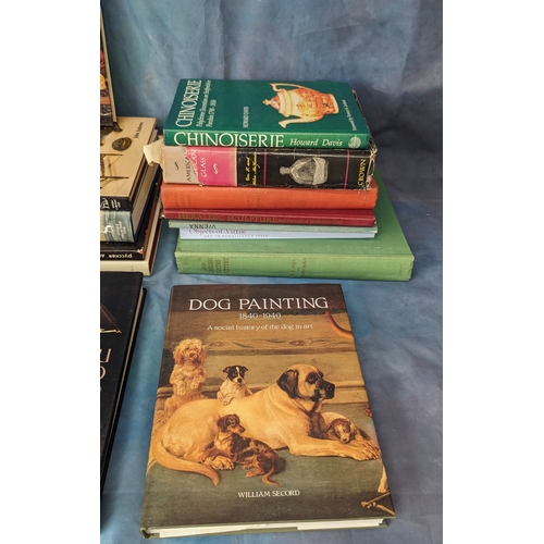 313 - An assortment of reference books - Dog Painting, Dolls