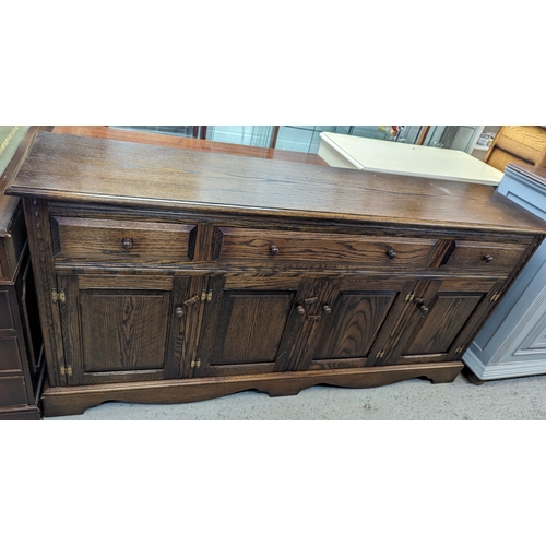 44 - A solid oak sideboard unit - 180 x 42 x 85cm