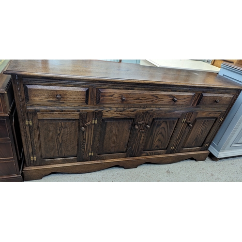 44 - A solid oak sideboard unit - 180 x 42 x 85cm