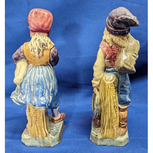 57 - A pair of Bruders Urbach Majolica figures (some repairs to bases as pictured)