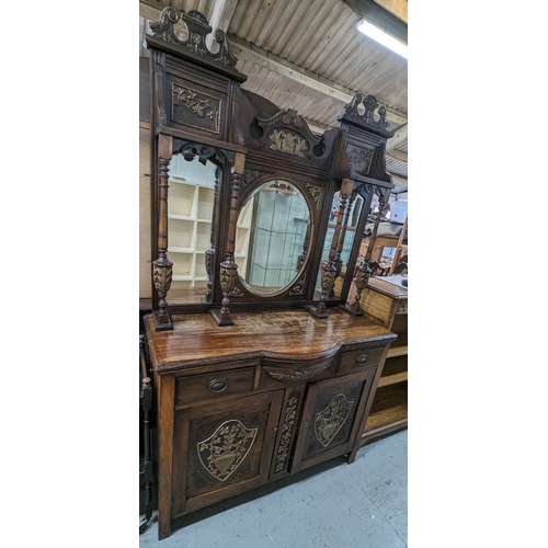 66 - An ornate mirror backed sideboard - 120 x 210 x 44cm