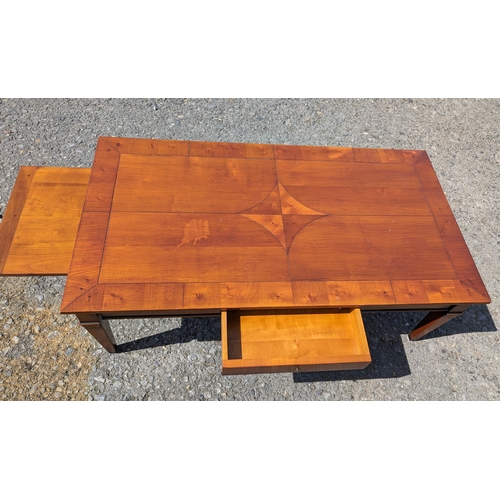 328 - A cross cut veneer coffee table with drawer - 43 x 120 x 65cm