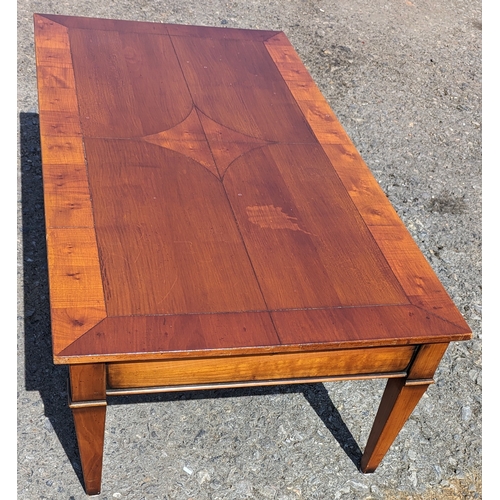 328 - A cross cut veneer coffee table with drawer - 43 x 120 x 65cm