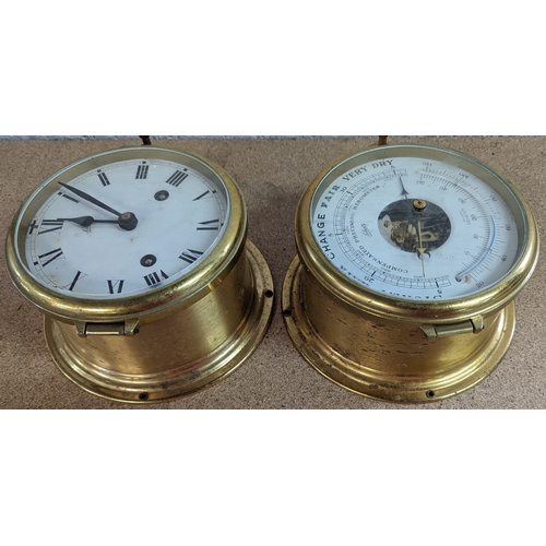 334 - A Brass Ships clock and barometer