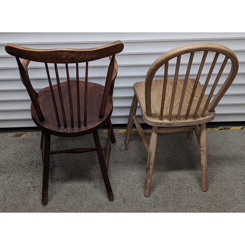 407 - 2 Unmatching chairs - An arched back kitchen chair and an antique carver