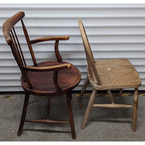 407 - 2 Unmatching chairs - An arched back kitchen chair and an antique carver