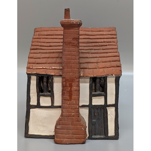 781 - An O'Donohue Pottery pottery Cottage (missing a chimney)