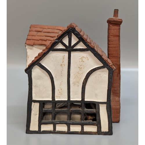 781 - An O'Donohue Pottery pottery Cottage (missing a chimney)