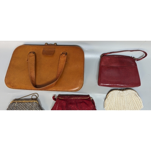 783 - A collection of Vintage handbags and clutches