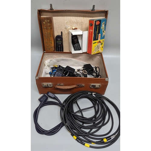 936 - Vintage suitcase including contents - Mobile phones, electric leads and more