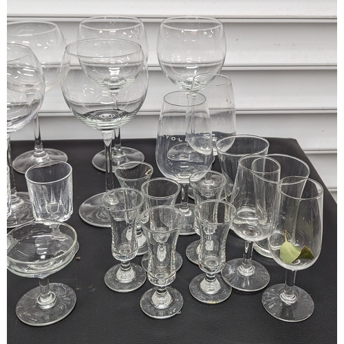 937 - A selection of mixed glasses including wine and shot glasses