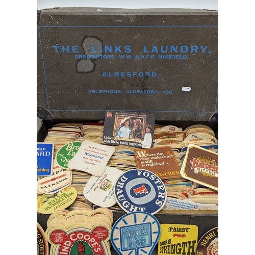 939 - A vintage 'Links Laundry' box containing vintage beer mats