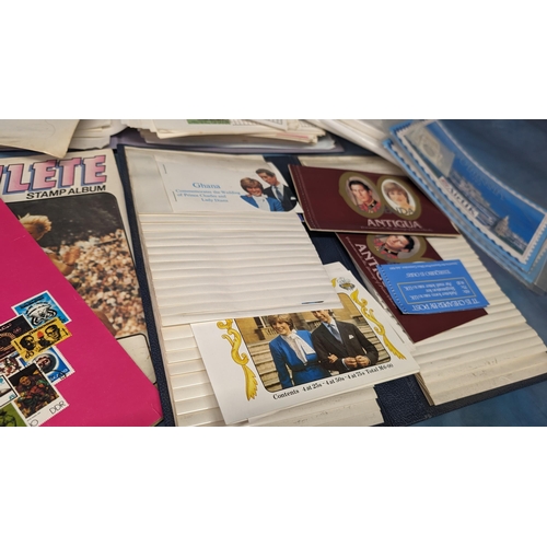 474 - Various Schoolboy albums of postage stamps, plus a collection of souvenir 1984 collection boxes from... 