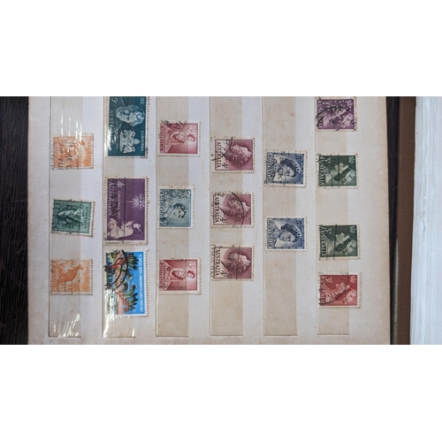 506 - A large selection of stamp albums containing - Britain, Worldwide, Commonwealth, King George VI and ... 