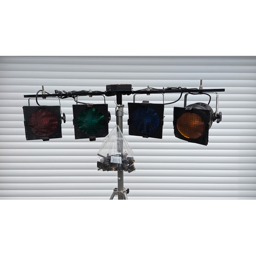 841 - 2x sets of 4 stage lights on tripod stands