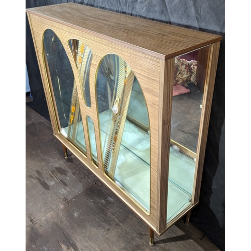 529 - A mid-century display cabinet with 2 glass shelves - needs attention to sliding doors as not staying... 