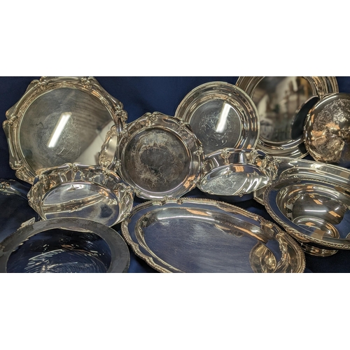 374 - A quantity of large vintage silverplated trays, platters and bowls.   From the country estate.