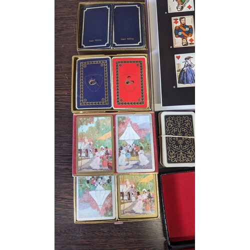 511 - A collection of assorted vintage playing cards and pencils - PLUS - 'Playing cards and their history... 