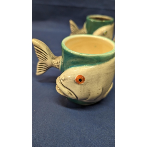 716 - A set of 6 handmade Porcelain Fish mugs with fishtail handles - 8cm tall. 5 with white insides - 1 w... 