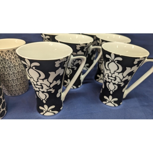 719 - A collection of 11 Tall black and white porcelain coffee mugs - 5x Maxwell Williams and 6x Other.   ... 