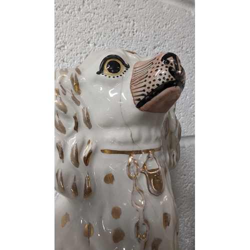 724 - 3x Antique Porcelain Staffordshire style Spaniel dogs - 2 x 32cm high approx - 1x 12cm high approx -... 