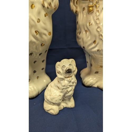 724 - 3x Antique Porcelain Staffordshire style Spaniel dogs - 2 x 32cm high approx - 1x 12cm high approx -... 