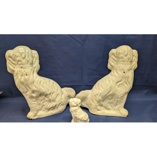 724 - 3x Antique Porcelain Staffordshire style Spaniel dogs - 2 x 32cm high approx - 1x 12cm high approx -... 