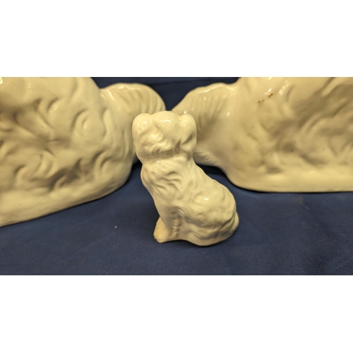 724 - 3x Antique Porcelain Staffordshire style Spaniel dogs - 2 x 32cm high approx - 1x 12cm high approx -... 