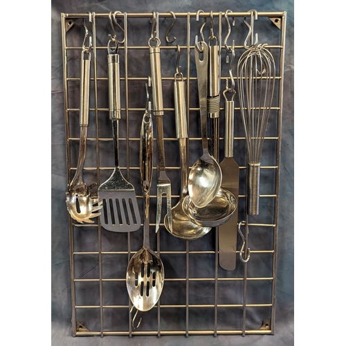 1056 - A stainless steel kitchen utensils rack