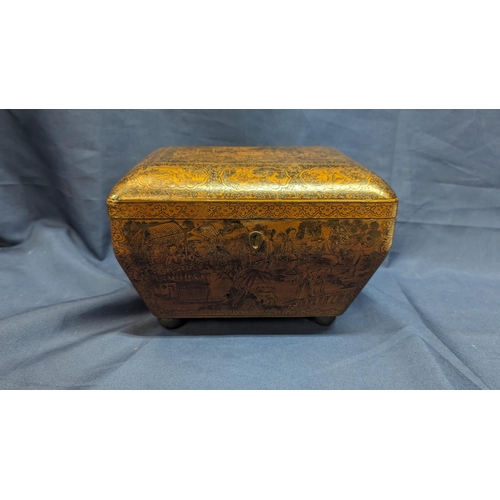 34 - An antique Chinese export lacquered stationary box with internal removeable shelf - Depicts village ... 