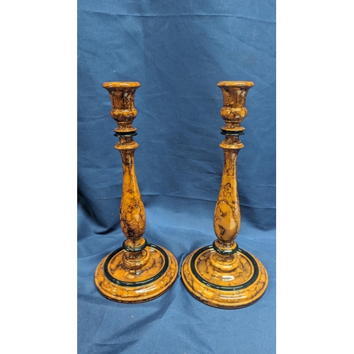 660 - A pair of vintage maple wood candlesticks - 31cm tall with no obvious chips or cracks.   From the co... 