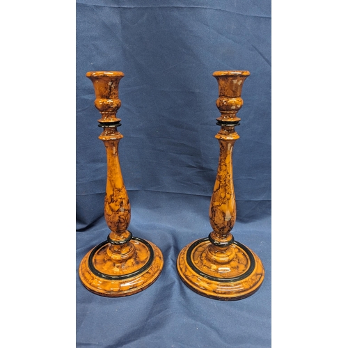 660 - A pair of vintage maple wood candlesticks - 31cm tall with no obvious chips or cracks.   From the co... 