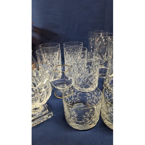 743 - A Large Quantity of Vintage and Art Deco Glassware - Including Stem Vases.   From the country estate... 