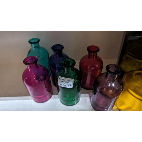 745 - A Selection of 9 x Coloured Vintage Bottles - Tallest 23cm.   From the country estate.