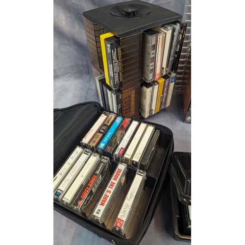 1076 - A quantity of cassette tapes and DVD's