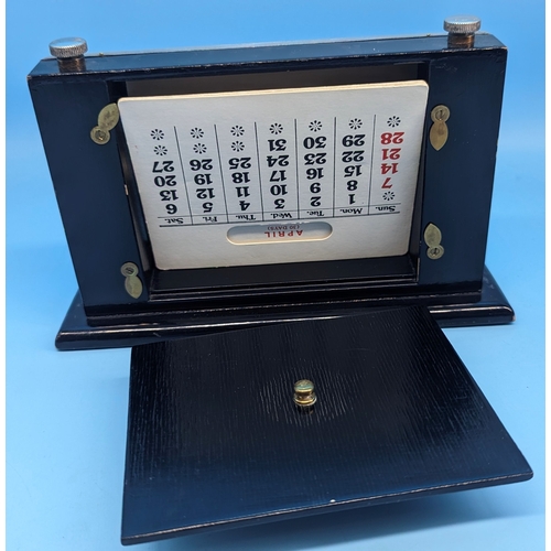 211 - A Hallmarked Silver perpetual desk calendar.   From the country estate.